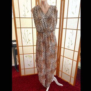 Leopard romper with cut outs on legs sz Small